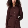 Blusa de seda con cinturón