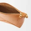 Bolsa plegable «Puzzle Fold» en piel de becerro napa brillante
