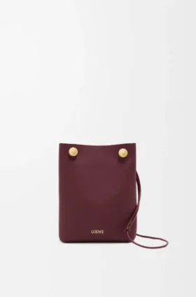 Bolsita «Pebble» en piel de becerro lisa
