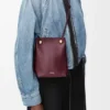 Bolsita «Pebble» en piel de becerro lisa