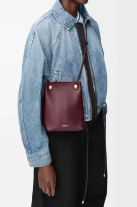 Bolsita «Pebble» en piel de becerro lisa