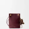Bolsita «Pebble» en piel de becerro lisa