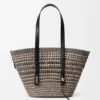 Bolso «Braid Basket» mediano de palma de iraca y piel de becerro