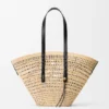 Bolso grande tipo cesta trenzada de palma de iraca y piel de becerro