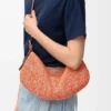 Bolso Loewe Swing mediano de rafia y piel de becerro