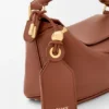 Bolso Mini Featherlight Puzzle de piel de cordero napa