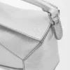 Bolso Mini Puzzle Edge en piel de cordero laminada