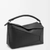 Bolso Puzzle Edge grande en piel de becerro granulada