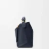 Bolso Puzzle Edge mediano en piel de becerro de grano suave