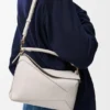 Bolso Puzzle Edge pequeño en piel de becerro de grano suave