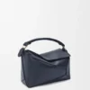 Bolso Puzzle Edge pequeño en piel de becerro de grano suave