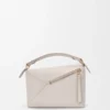 Bolso Puzzle Edge pequeño en piel de becerro de grano suave