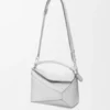 Bolso Puzzle Edge pequeño en piel de cordero laminada