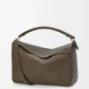 Bolso Puzzle grande en piel de becerro granulada y flexible