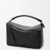 Bolso Puzzle grande en piel de becerro granulada y flexible