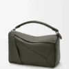 Bolso Puzzle grande en piel de becerro granulada y flexible