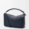 Bolso Puzzle grande en piel de becerro granulada y flexible