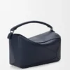 Bolso Puzzle grande en piel de becerro granulada y flexible