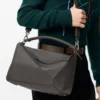 Bolso Puzzle grande en piel de becerro granulada y flexible