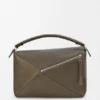 Bolso Puzzle grande en piel de becerro granulada y flexible