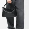 Bolso Puzzle grande en piel de becerro granulada y flexible