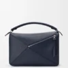Bolso Puzzle grande en piel de becerro granulada y flexible