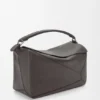 Bolso Puzzle grande en piel de becerro granulada y flexible