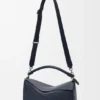 Bolso Puzzle grande en piel de becerro granulada y flexible