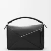Bolso Puzzle grande en piel de becerro granulada y flexible