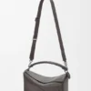 Bolso Puzzle grande en piel de becerro granulada y flexible