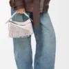 Bolso Puzzle pequeño con flecos en piel de becerro clásica