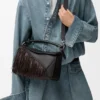 Bolso Puzzle pequeño con flecos en piel de becerro clásica
