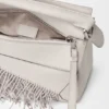 Bolso Puzzle pequeño con flecos en piel de becerro clásica