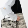 Bolso Puzzle pequeño en tejido trenzado