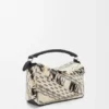 Bolso Puzzle pequeño en tejido trenzado