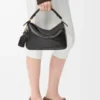 Bolso Puzzle pequeño Featherlight en piel de cordero napa