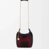 Bolso «Squeeze» mini de piel con abalorios
