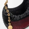 Bolso «Squeeze» mini de piel con abalorios