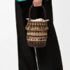 Bolso tipo cubo de cordón y piel