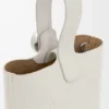 Bolso tipo Pebble Bucket mini en piel de becerro granulada suave