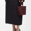Bolso tipo Pebble Bucket «Mini Pebble» en piel de becerro lisa