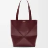 Bolso tote mediano «Puzzle Fold» en piel de becerro brillante
