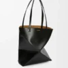 Bolso tote mediano «Puzzle Fold» en piel de becerro brillante