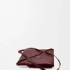 Bolso tote mediano «Puzzle Fold» en piel de becerro brillante