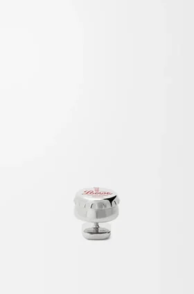 Broche con forma de tapón de botella