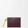 Cartera compacta «Knot» en piel de becerro napa brillante