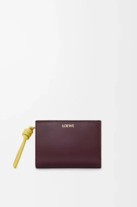 Cartera compacta «Knot» en piel de becerro napa brillante