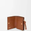Cartera compacta «Knot» en piel de becerro napa brillante