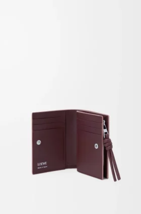 Cartera compacta «Knot» en piel de becerro napa brillante
