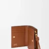 Cartera compacta «Knot» en piel de becerro napa brillante